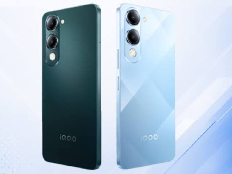 Two iQOO smartphones displayed side-by-side: one in a dark green finish and the other in a light blue shade with a geometric diamond pattern, both showing dual camera sensors on the back.
